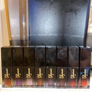 8 different lip gloss colors x 6 of each. Total 30